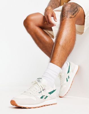 Reebok Classic leather trainers in off white and green