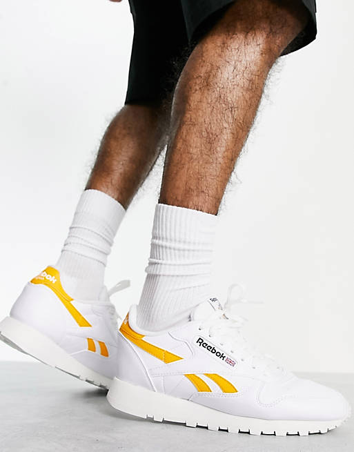 asos.com | Reebok Classic Leather trainers in white and gold