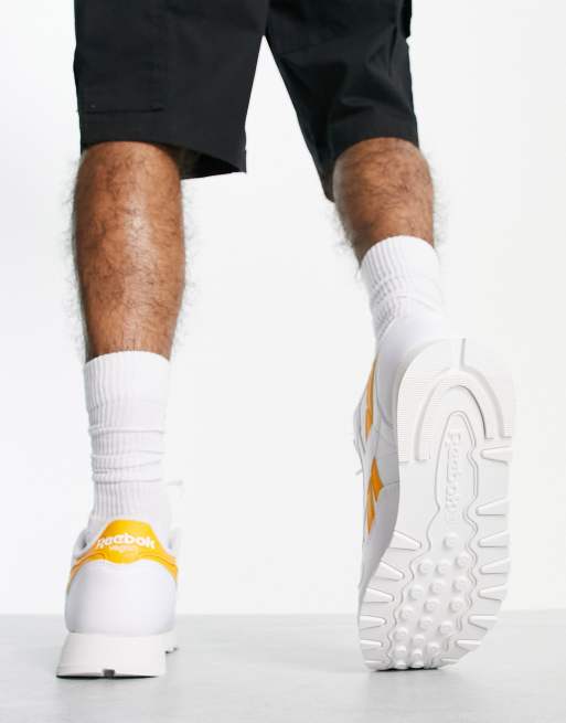 Reebok shorts store mens gold