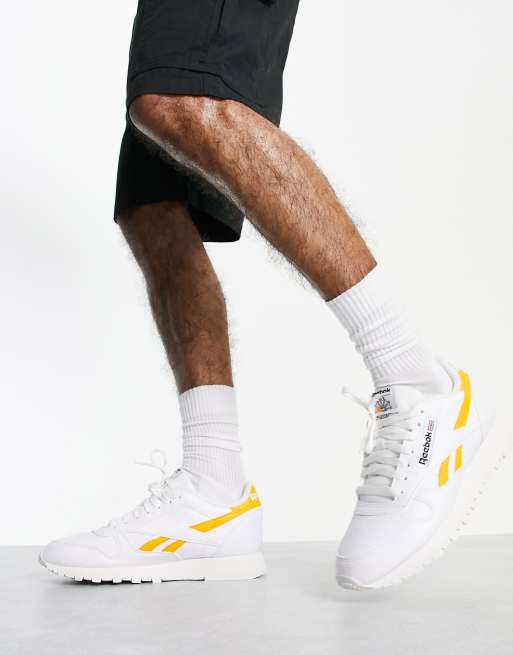 reebok white and gold