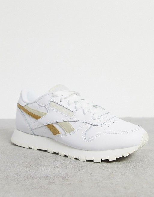 Reebok Classic Leather trainers in white with gold detailing