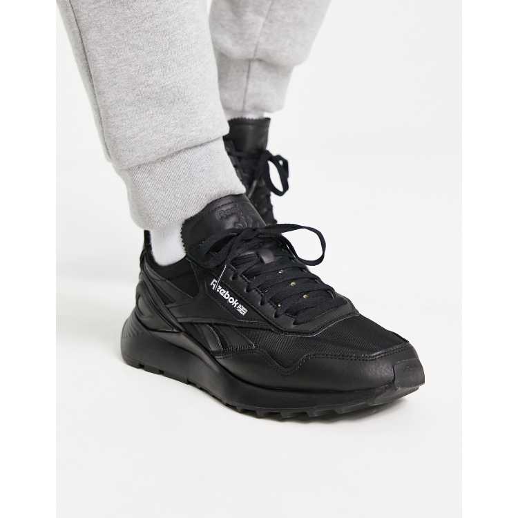 Reebok all black store shoes