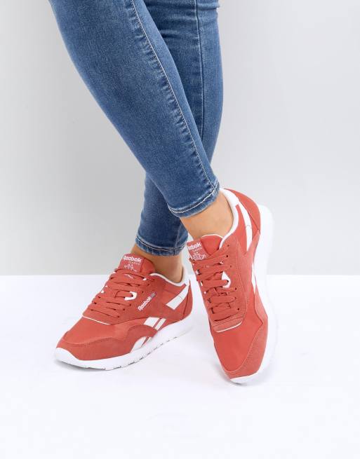 orange reebok trainers