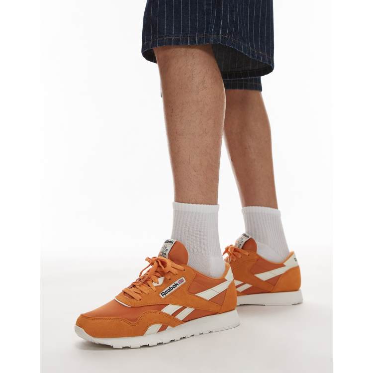 Reebok Classic nylon trainers in orange ASOS