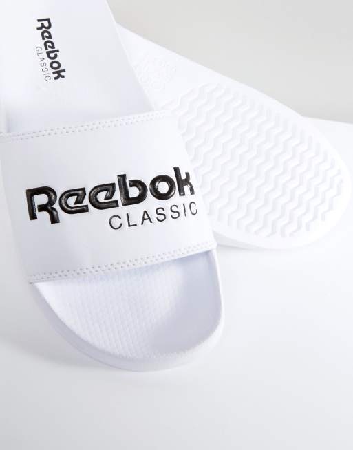 Reebok store sliders white