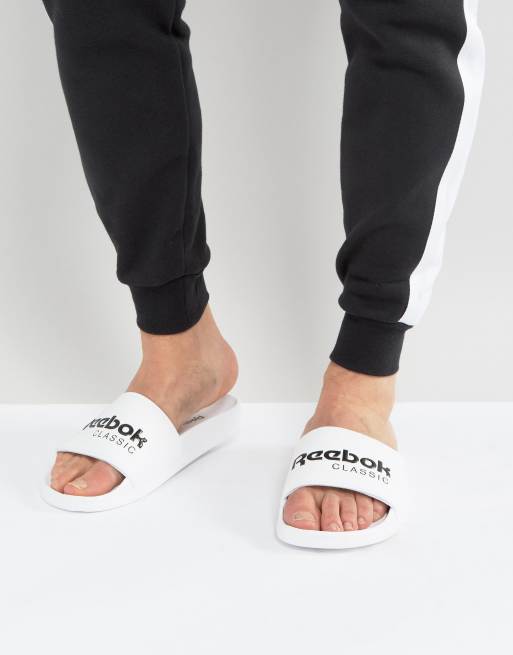 Reebok store sliders white