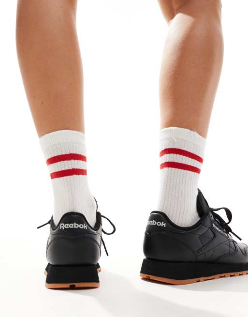 Reebok nere pelle on sale
