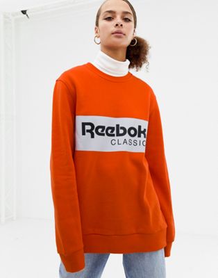 orange reebok sweatshirt