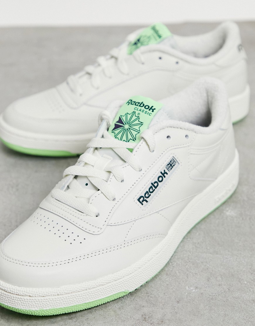 Reebok Classics Club C 85 sneakers in white with neon sole