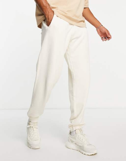 Reebok store joggers white