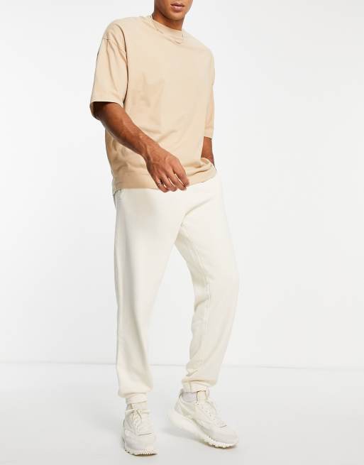 Reebok sweatpants shop mens white