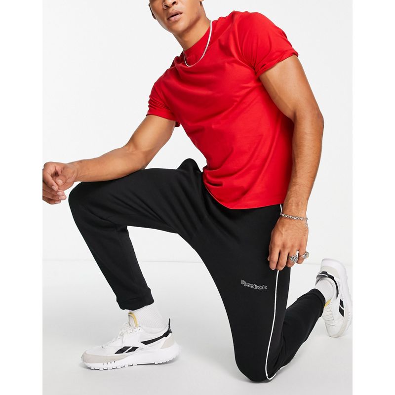 Pantaloni e leggings Uomo Reebok Classics - Joggers neri con profili a contrasto e logo