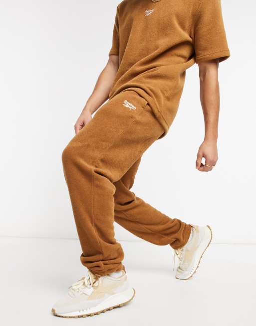 Reebok Cozy cuffed trackies in brown, ASOS