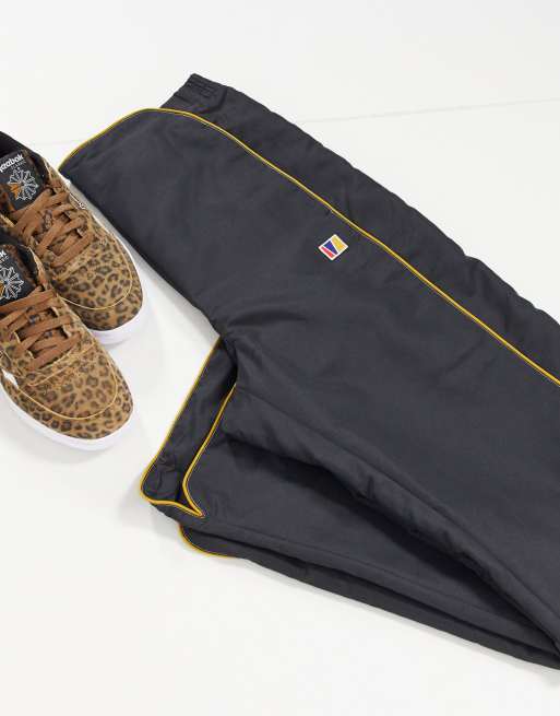 Reebok on sale trousers gold