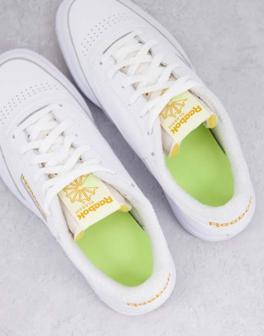 Tuta reebok bianca store e oro