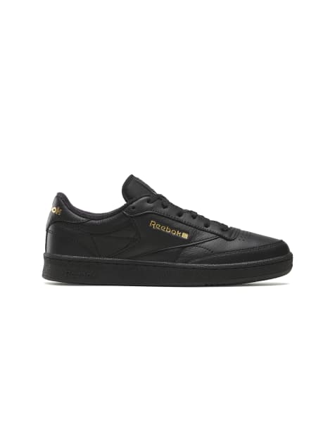 Reebok Club C 85 trainers in black and gold - view 1