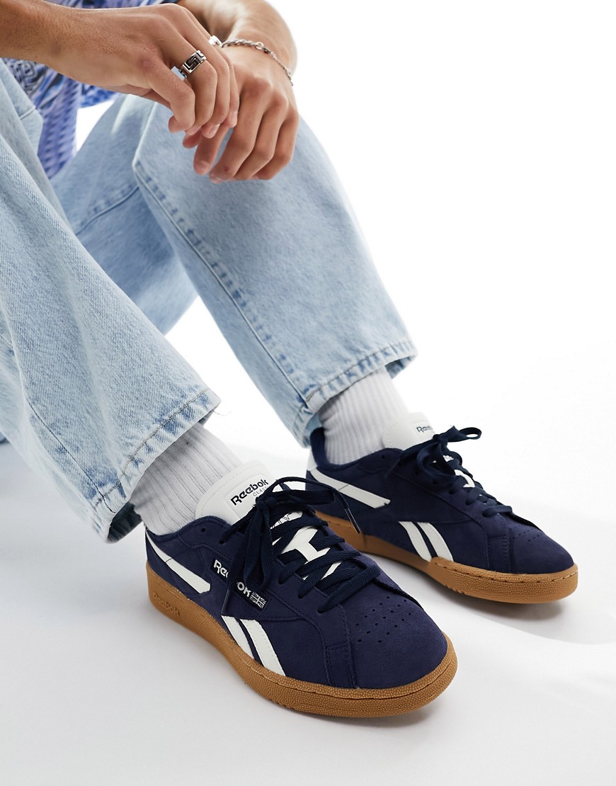 Reebok Club C Grounds trainers in navy with gum sole