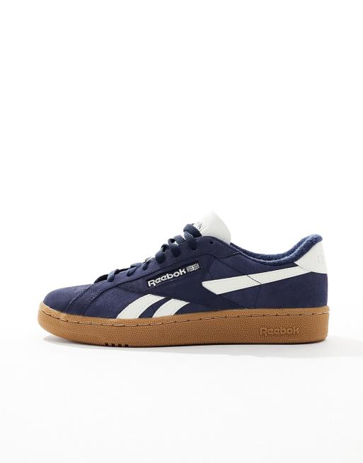 Reebok Club C Grounds trainers in navy with gum sole ASOS