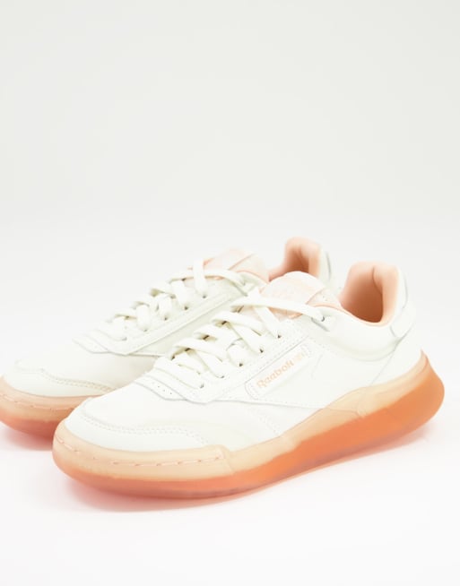 Reebok Club C Legacy sneakers in chalk with orange sole