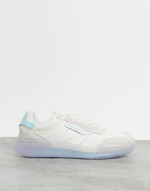Reebok Club C Legacy trainers in off white with blue detailing