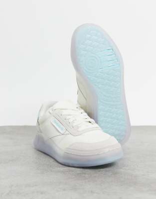 white and light blue reebok