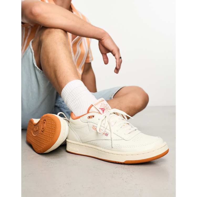 por otra parte, Dispensación Ambicioso Reebok Club C Mid II Vintage sneakers in chalk with orange detail | ASOS