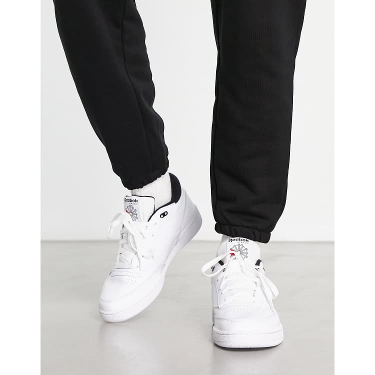 Reebok Club C mid sneakers in white and black ASOS