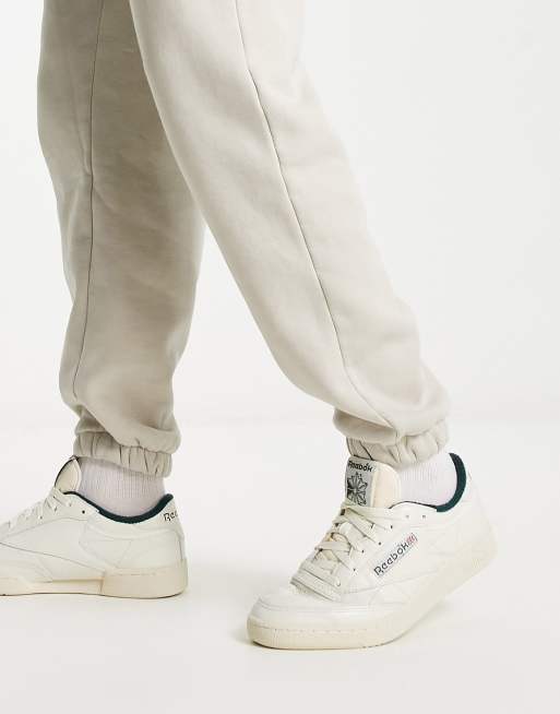 Tuta reebok nera e verde shop