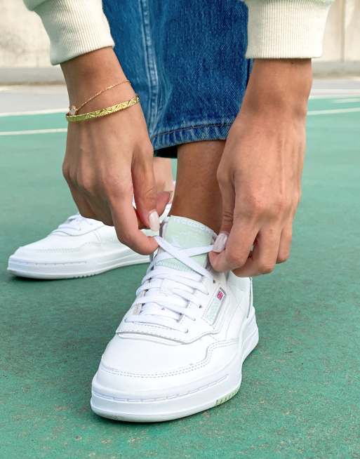 Reebok Court Peak trainers in white and sage green