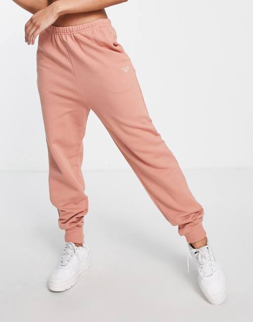 Reebok cozy cuffed joggers in pink