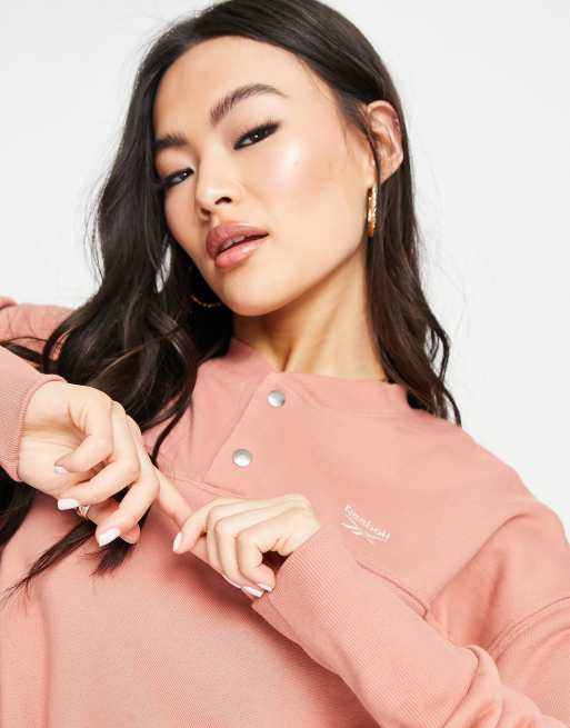 Reebok - Cropped sweatshirt met knoopsluiting in roze