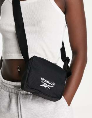 Reebok cross body bag in black | ASOS