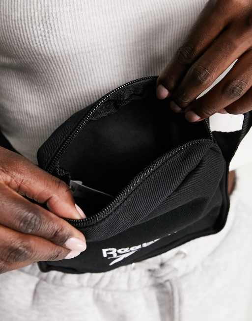 Reebok cross body bag in black | ASOS