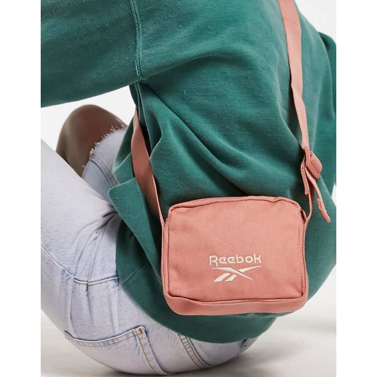 Reebok cross body bag in pink ASOS