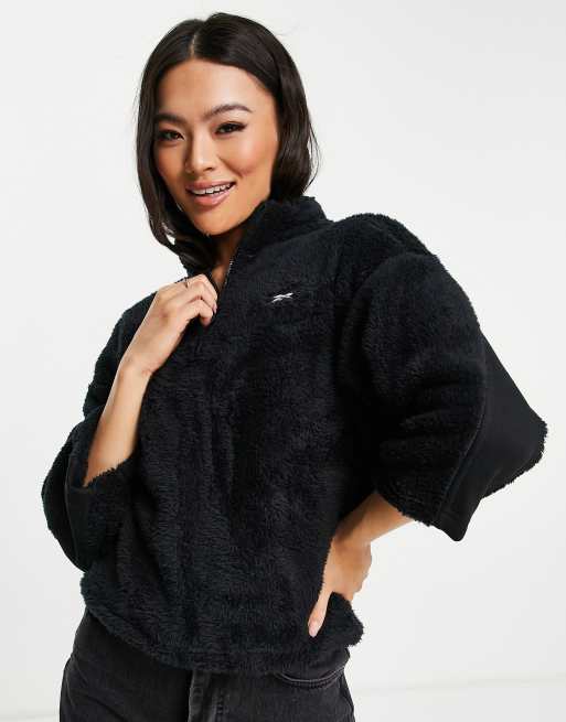 Reebok – Czarna, przytulna bluza polarowa z zamkiem pod szyją