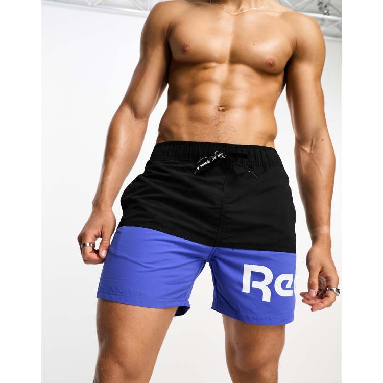 Reebok Deakin colour block swim short in blue and black | ASOS