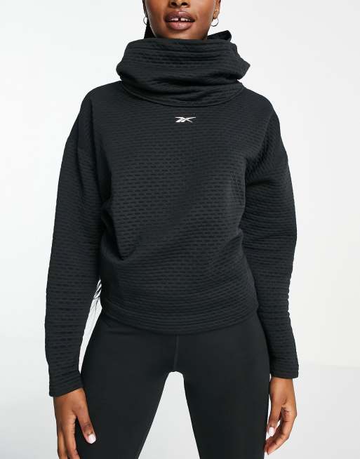 Felpa reebok nera con strisce bianche shop