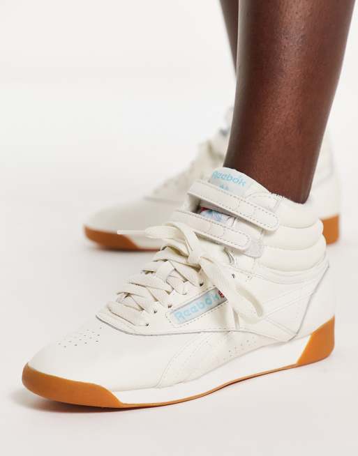 Reebok Freestyle Hi trainers in chalk with gum sole