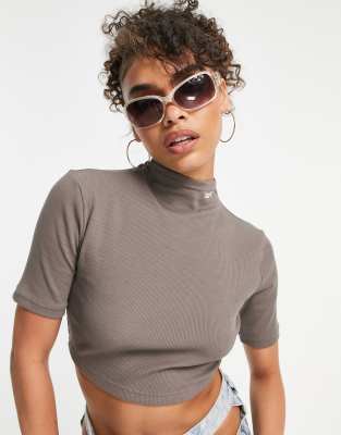 Reebok Reebok high neck ribbed crop top in taupe brown