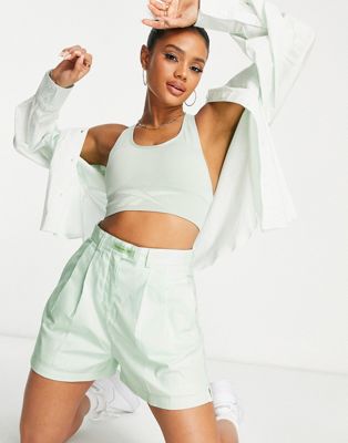 Reebok high waisted tailored shorts in pastel green - ASOS Price Checker
