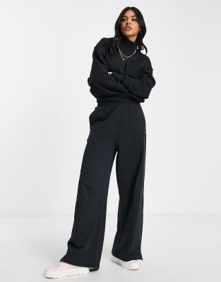 Reebok high waisted wide leg trousers in black