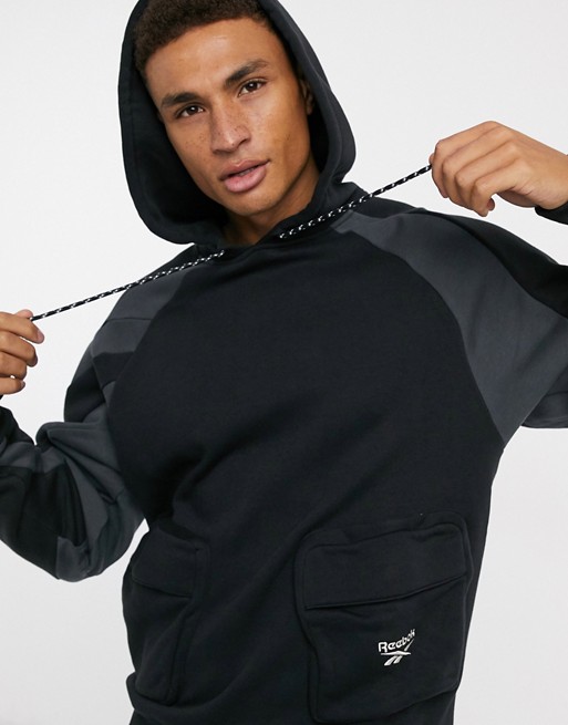 Reebok hoodie with cargo pockets in black
