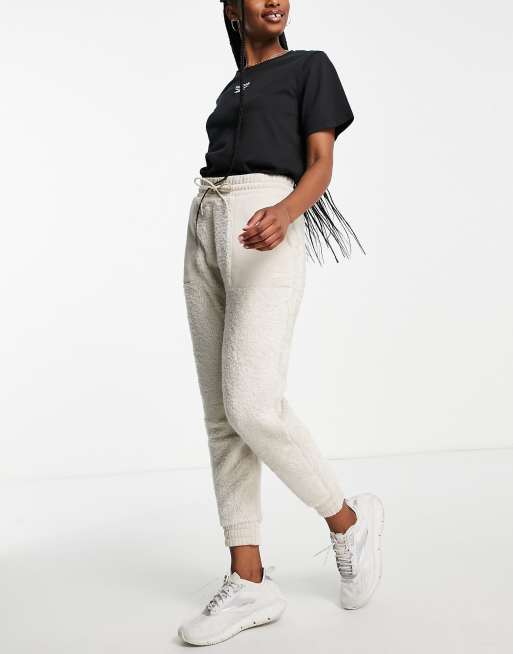 Reebok - Jogger confortable en polaire - Grège