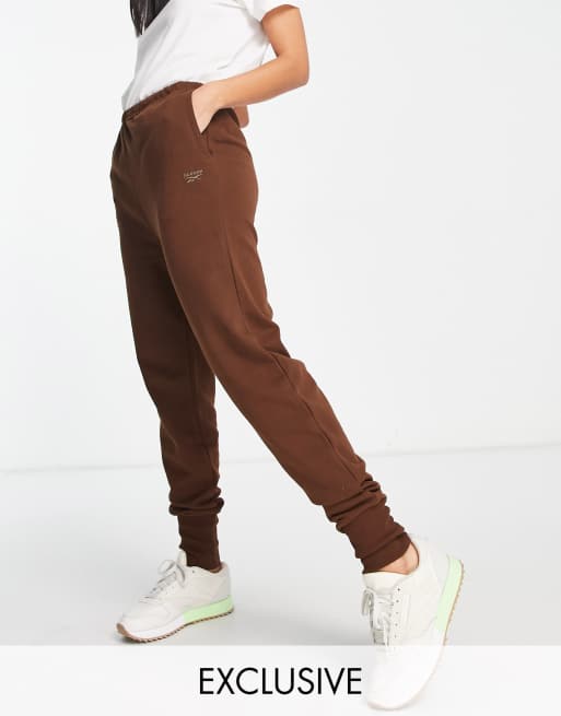 Reebok - Joggers comodi marroni con fondo elasticizzato