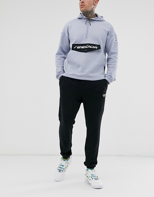 Reebok joggers in black with small logo