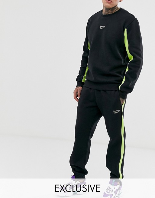 Reebok joggers with neon side stripe In black Exclusive to Asos