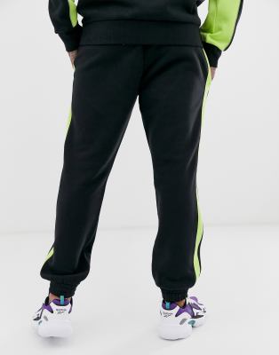 black joggers with neon stripe