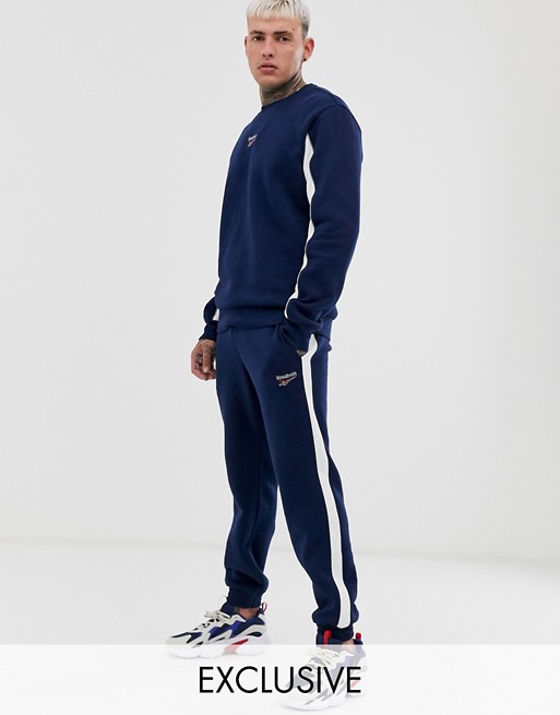 Reebok joggers with side stripe In navy Exclusive to Asos