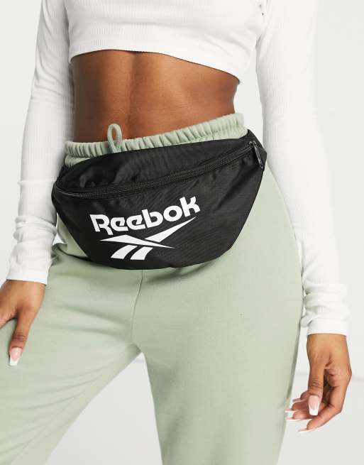 Reebok large logo fanny pack in black | ASOS