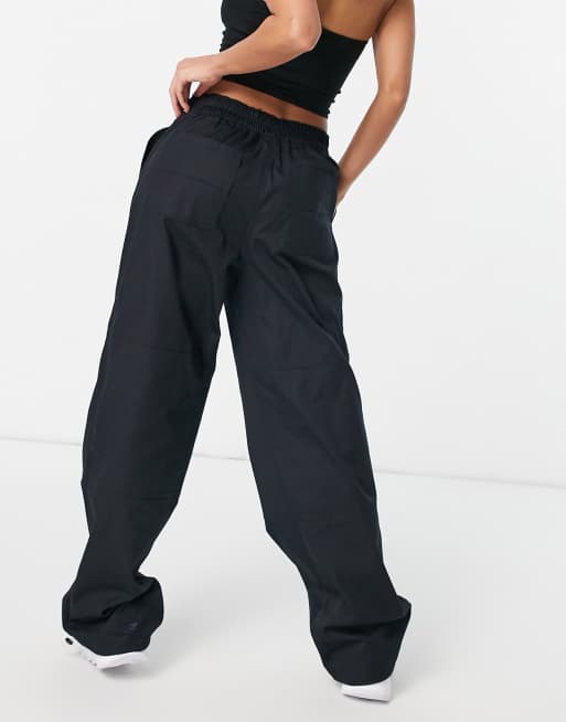 Reebok logo cargo pants in black